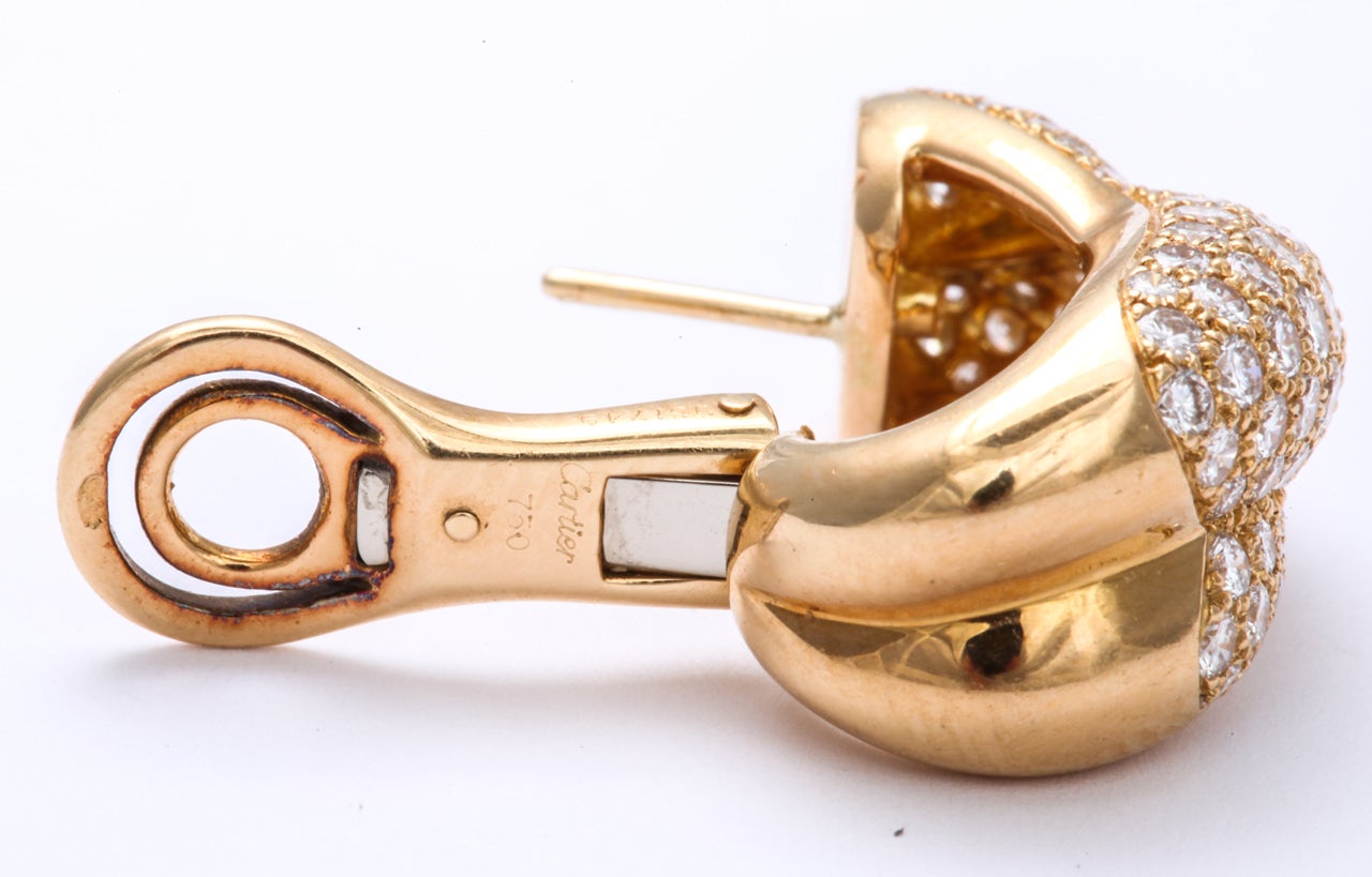 CARTIER Diamond Gold Crossed Omega Earrings For Sale 2