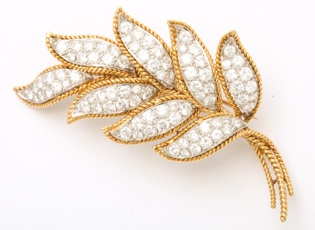Authentic Van Cleef & Arpels VCA Yellow Gold Diamond Leaf Brooch. Set in 18k yellow gold, diamonds weighing 6 carats approximately. Length - 2 3/8