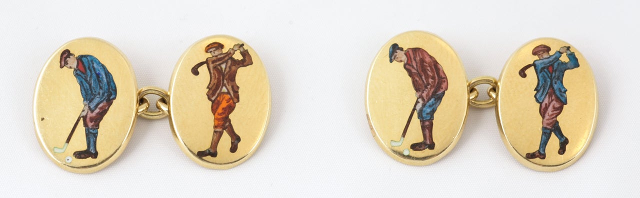 1970's 18ct oval gold cufflinks with hard baked enamel golfers, putter and driver. English