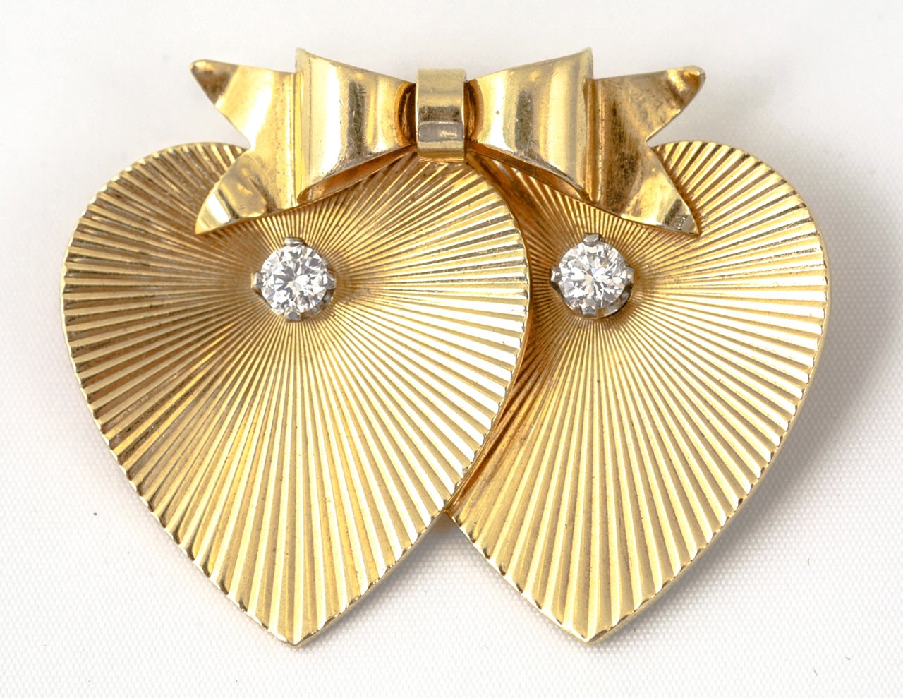 18ct gold Tiffany and Co,double heart brooch with diamonds

C. 1960