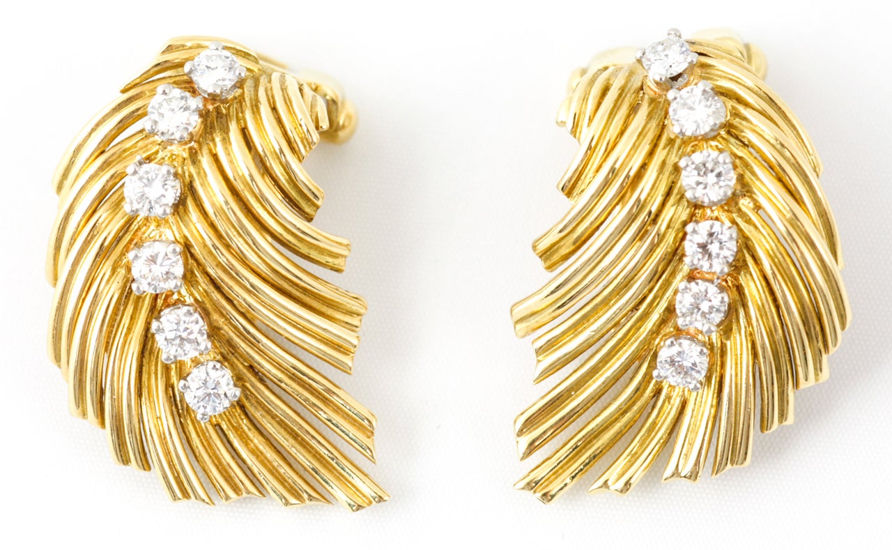 Van Cleef and Arpels,18ct gold and diamond leaf clip earrings

C. 1960