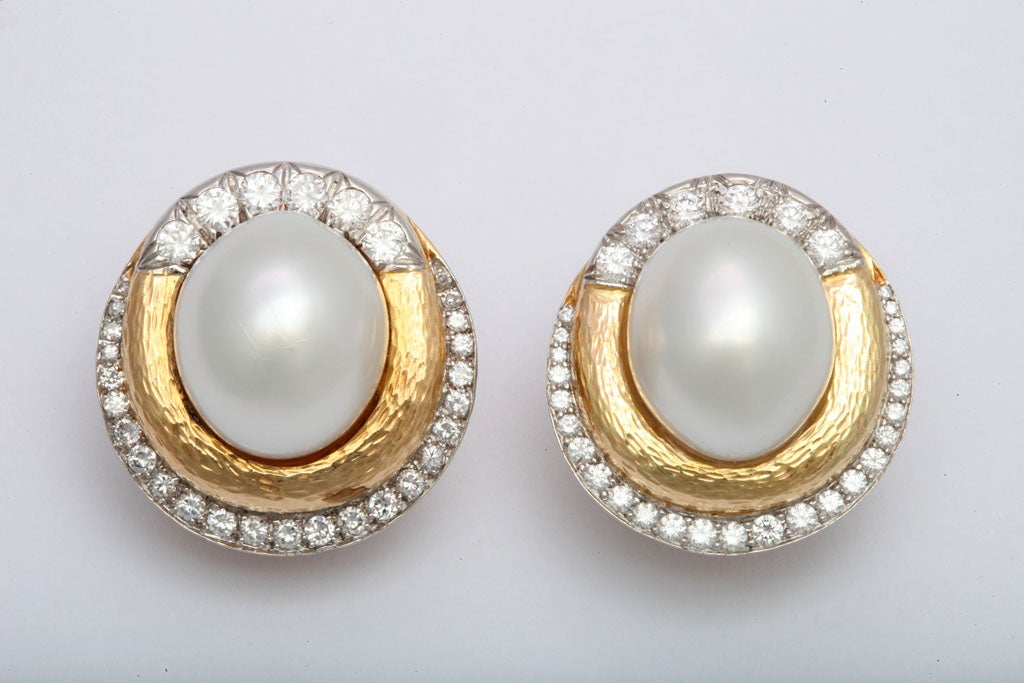 Beautiful pair of David Webb earrings with a 15mm South Sea Pearl and Approximately 3cts tw in diamonds in 18kt gold