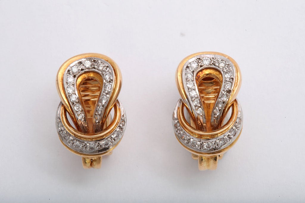 Beautiful Lalaounis Diamond Earrings in the shape of a pretzel knot with approximately 1 ct tw. in diamonds.