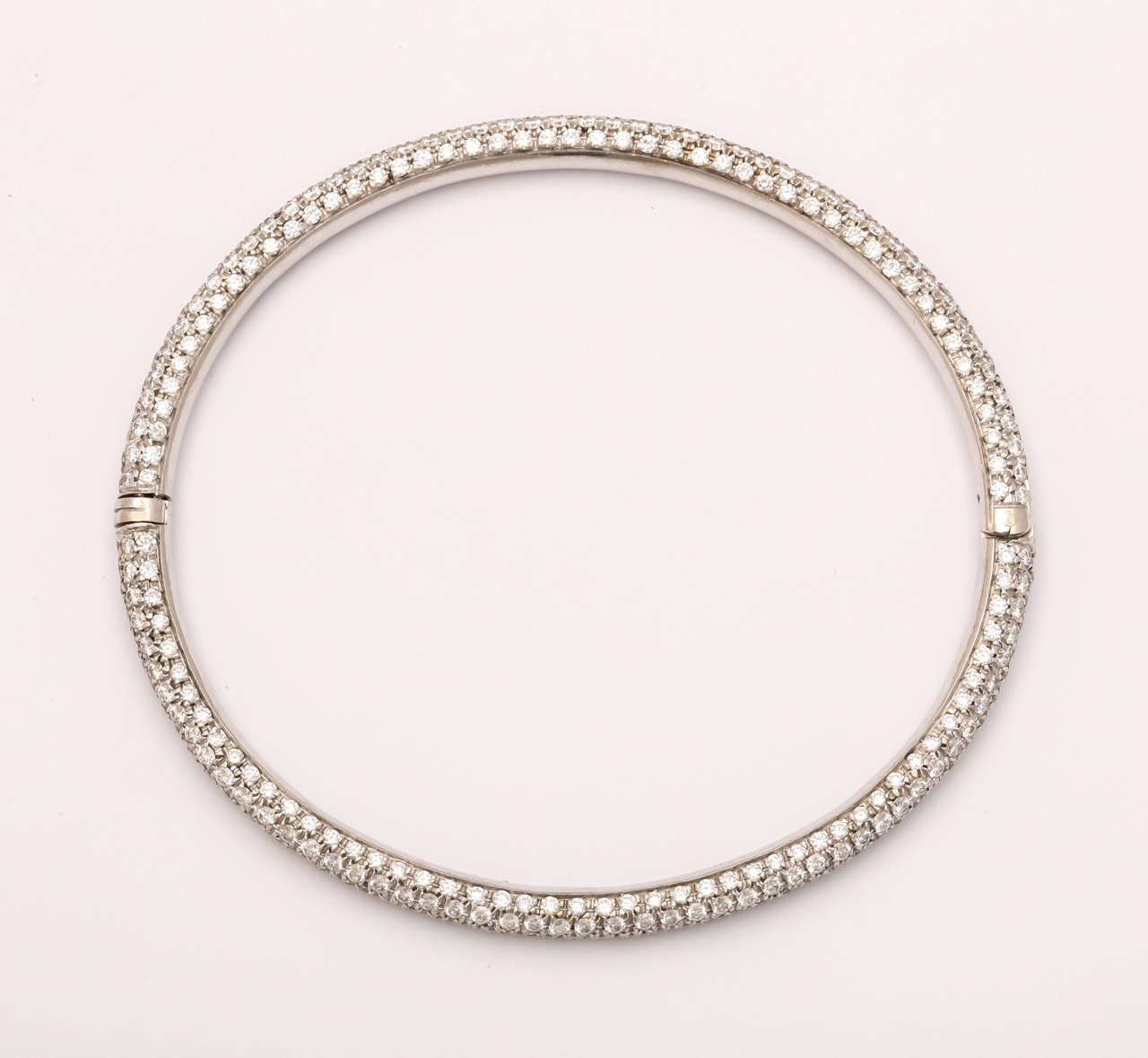 18k white gold bangle 31 grams pave set with 500 full cut diamonds approximate total weight 5.00 carats