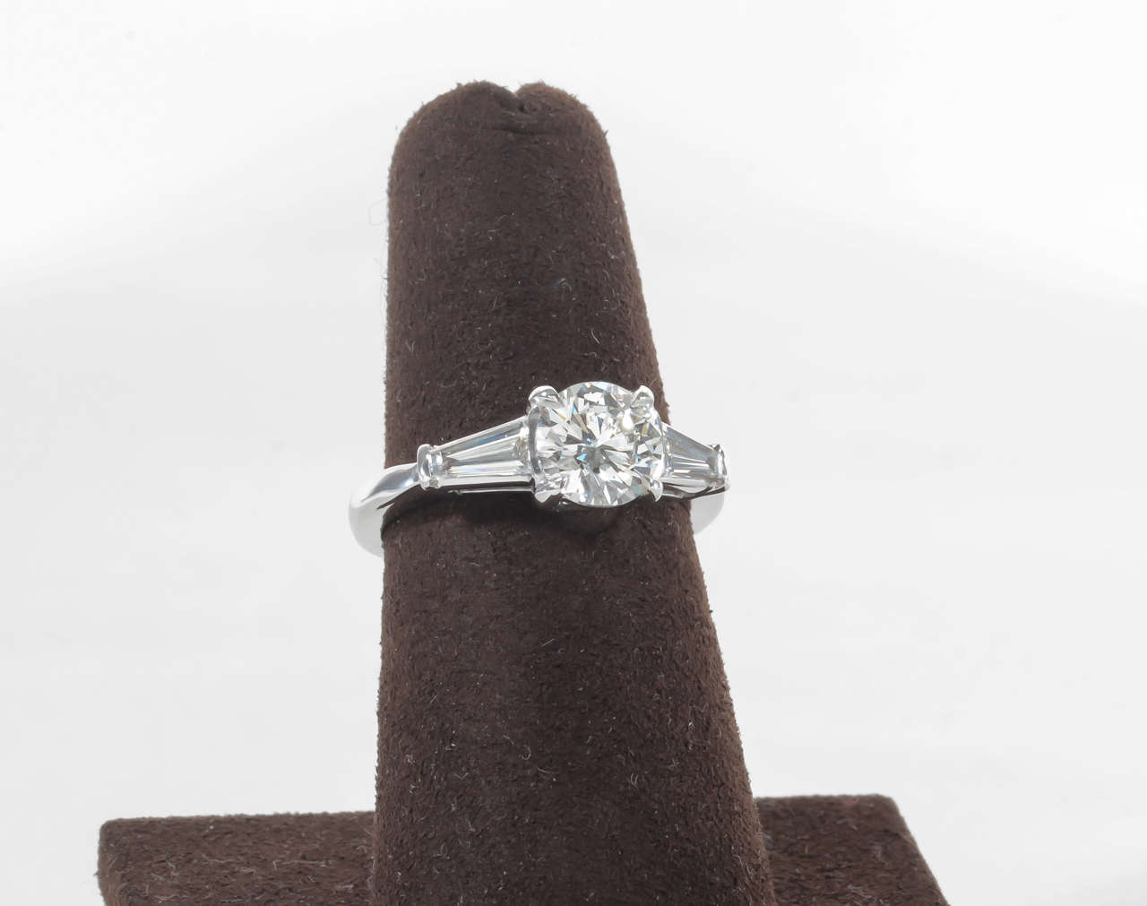 Classic Round Diamond Engagement Ring with Tapered Baguettes In Excellent Condition In New York, NY
