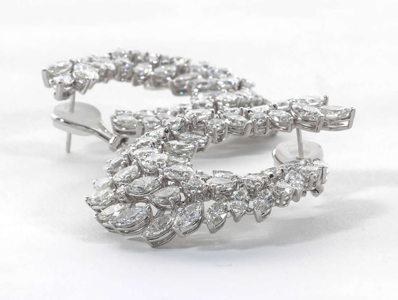 Pear Cut Impressive Diamond White Gold Wreath Swirl Earrings For Sale