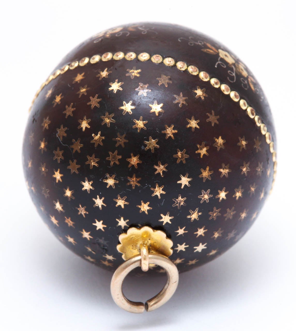Women's Beads of Gold and Heavenly Stars and Flowers on a Pique Ball Pendant