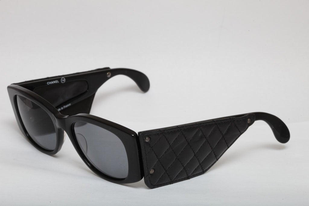 1988 Chanel leather sunglasses with quilted details. Comes with a Chanel box and a matching leather case. Frame width 5.9 inches, height 2.1 inches. Signed Chanel Made in France.