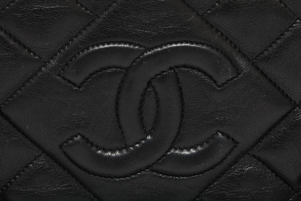 Women's CHANEL BLACK QUILTED BAG WITH TASSEL