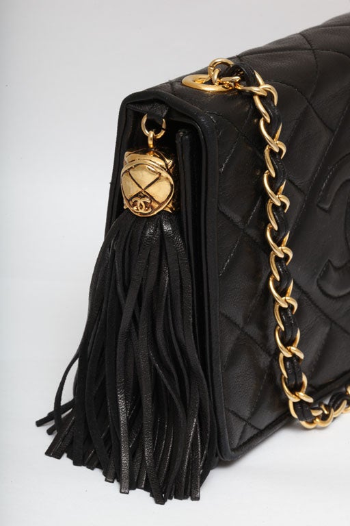 CHANEL BLACK QUILTED BAG WITH TASSEL 1