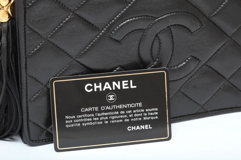 CHANEL BLACK QUILTED BAG WITH TASSEL 6