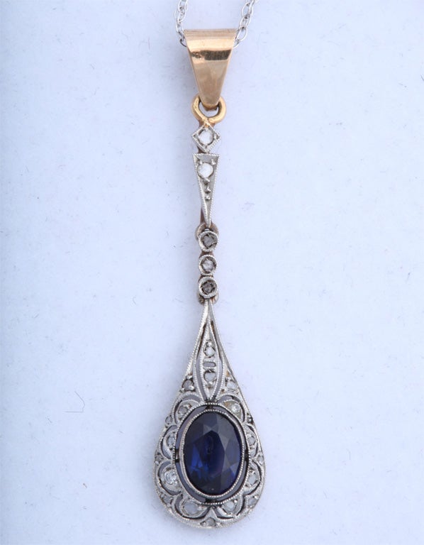 Edwardian Period, 14K white and yellow gold, sapphire and diamond pendant, American, Ca. 1910. Pendant, to top of baille, measures @1 3/4