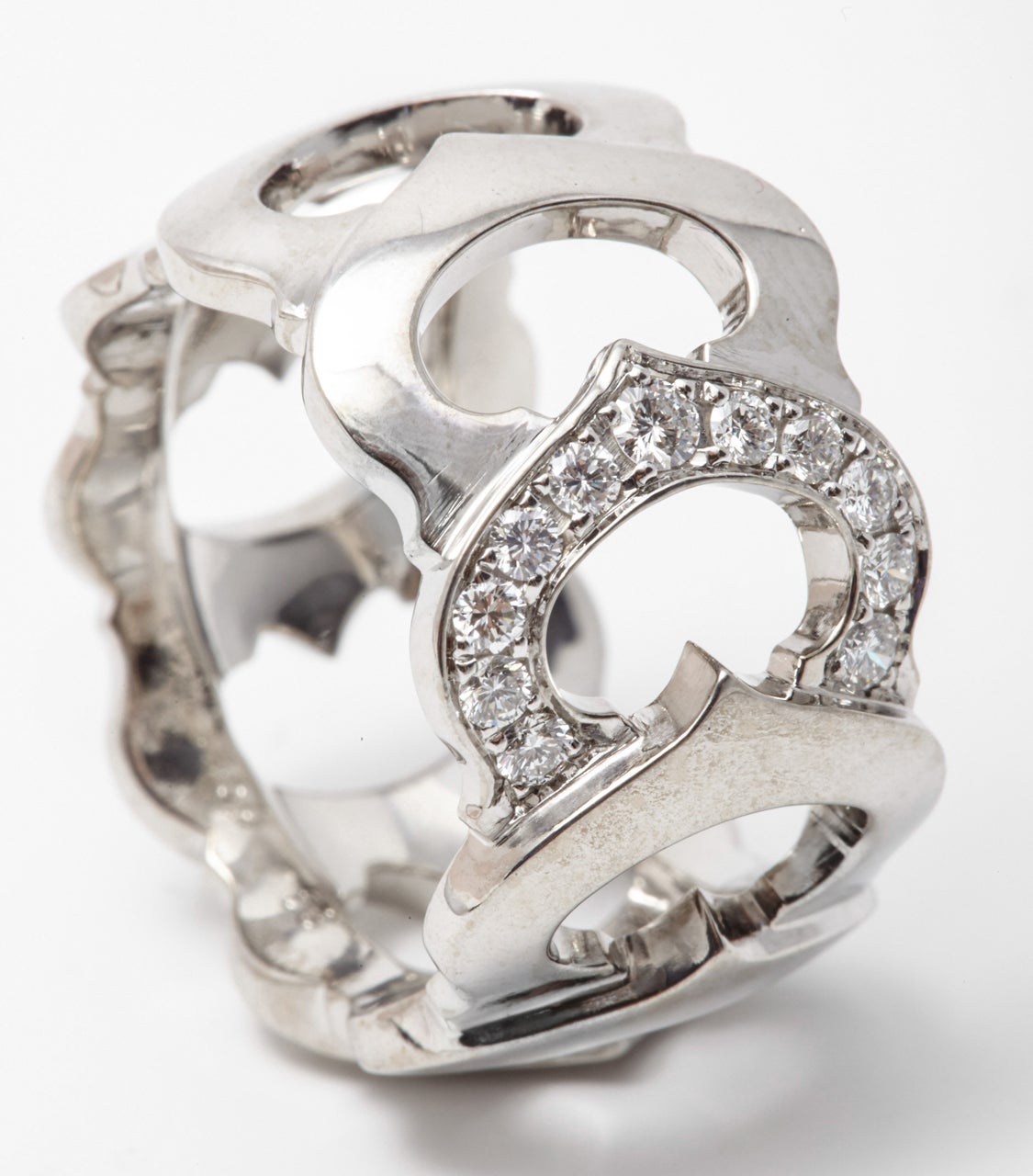 A golden and diamond ring by Cartier