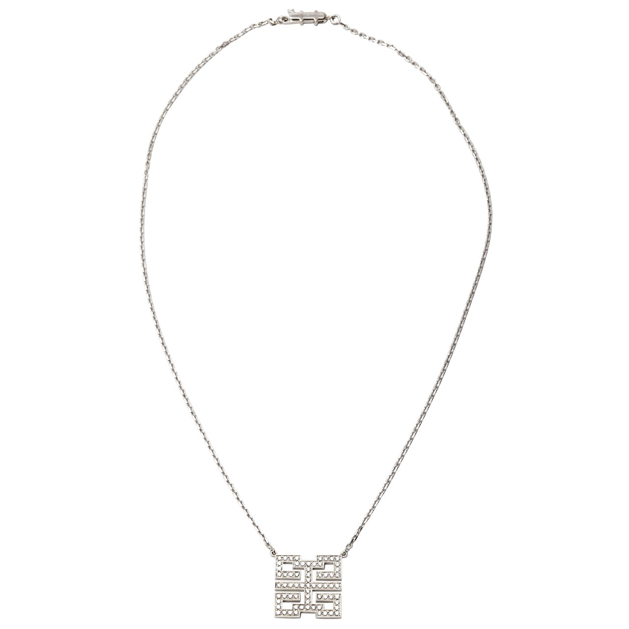 A golden and diamond necklace by Cartier For Sale