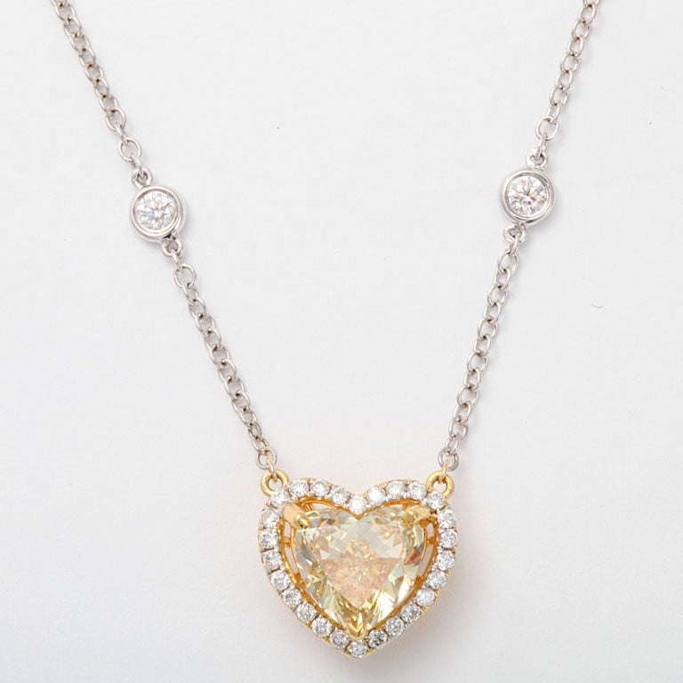 Heart shape Fancy Color Heart shape Diamond 2.30 carats
colorless diamonds around  26 diamonds 0.52
18k white gold diamond Chain  6 diamond 0.46