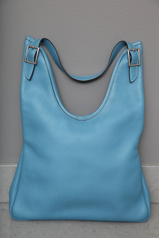 Hermes Massai bag in Blue Jean. Togo leather, Silver hardware.<br />
Stamped Hermes Paris Made in France. Year stamp F in square. Comes with Hermes box, dust covers, shoulder strap.