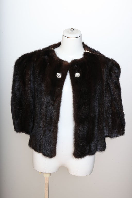Dark brown mink fur coat with rhinestones.<br />
Size S-M.