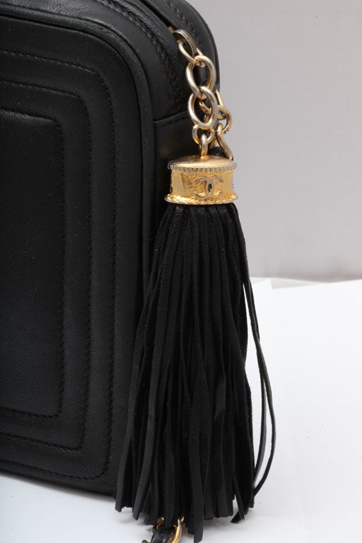 VINTAGE CHANEL BLACK BAG WITH TASSEL 2