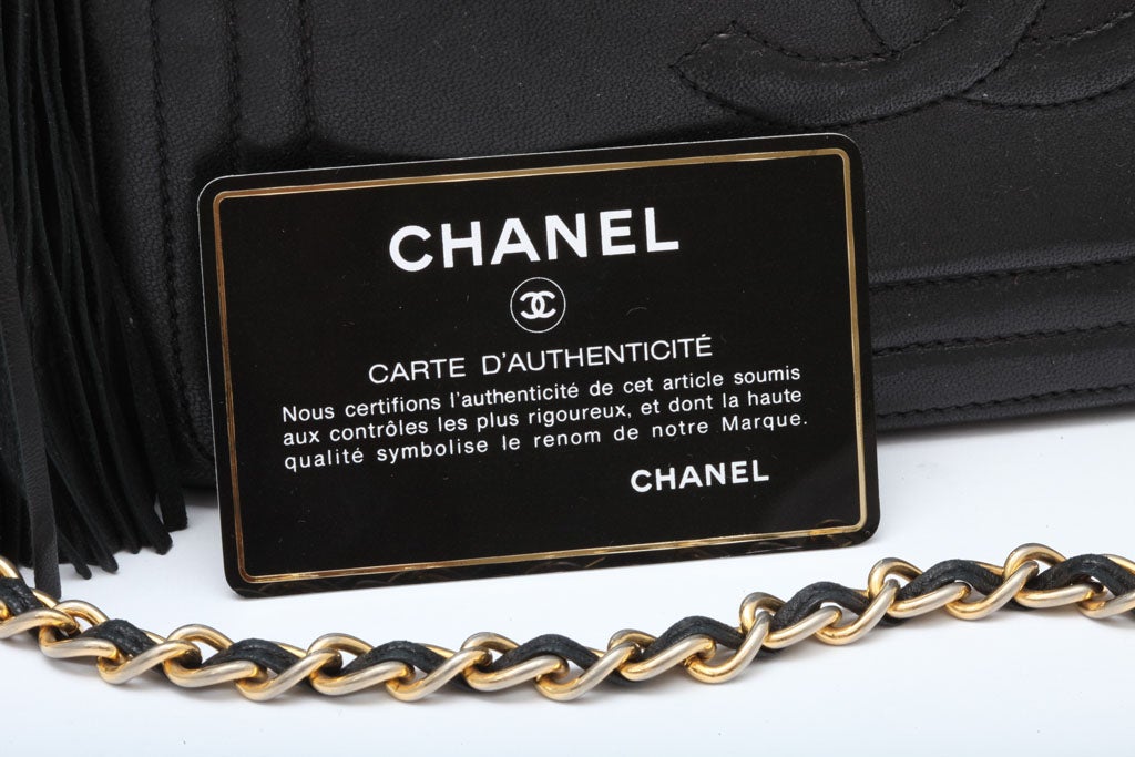 VINTAGE CHANEL BLACK BAG WITH TASSEL 7