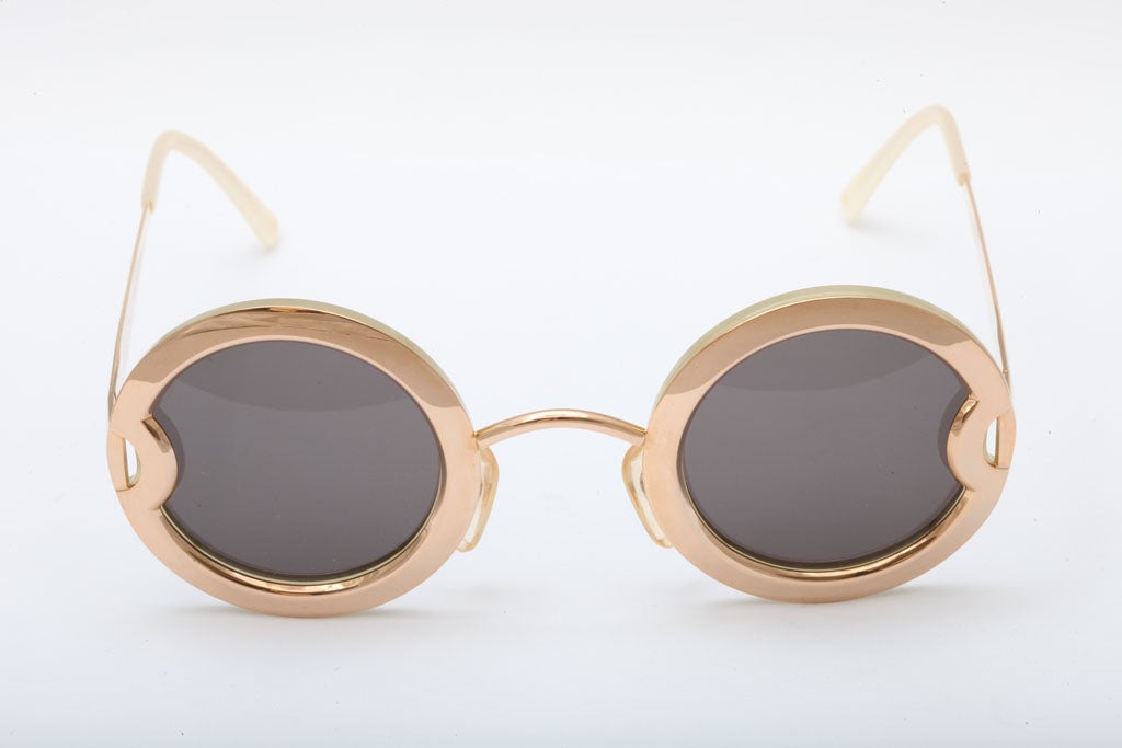 Vintage Christian Dior sunglasses with gold plated frame and mother of pearl.
