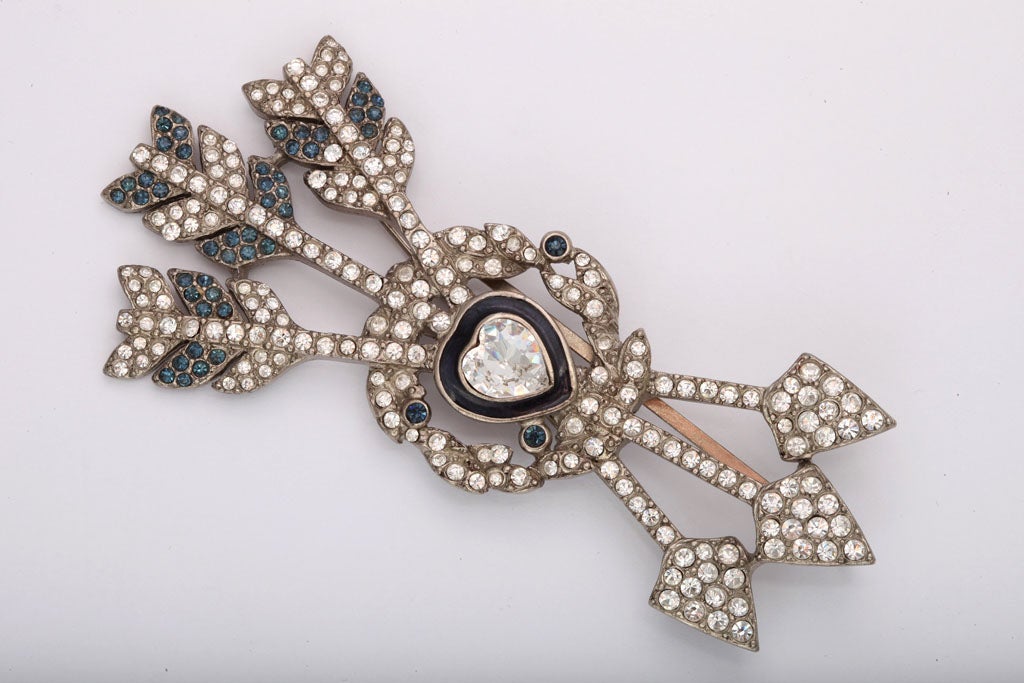 A Christian Dior vintage heart and arrow large brooch. Paste diamonds and sapphires with enamel.  Very collectable.