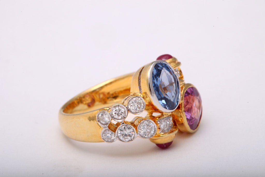 Pink and Blue Sapphire Gold Crossover Ring with Diamonds and Ruby Accents 1