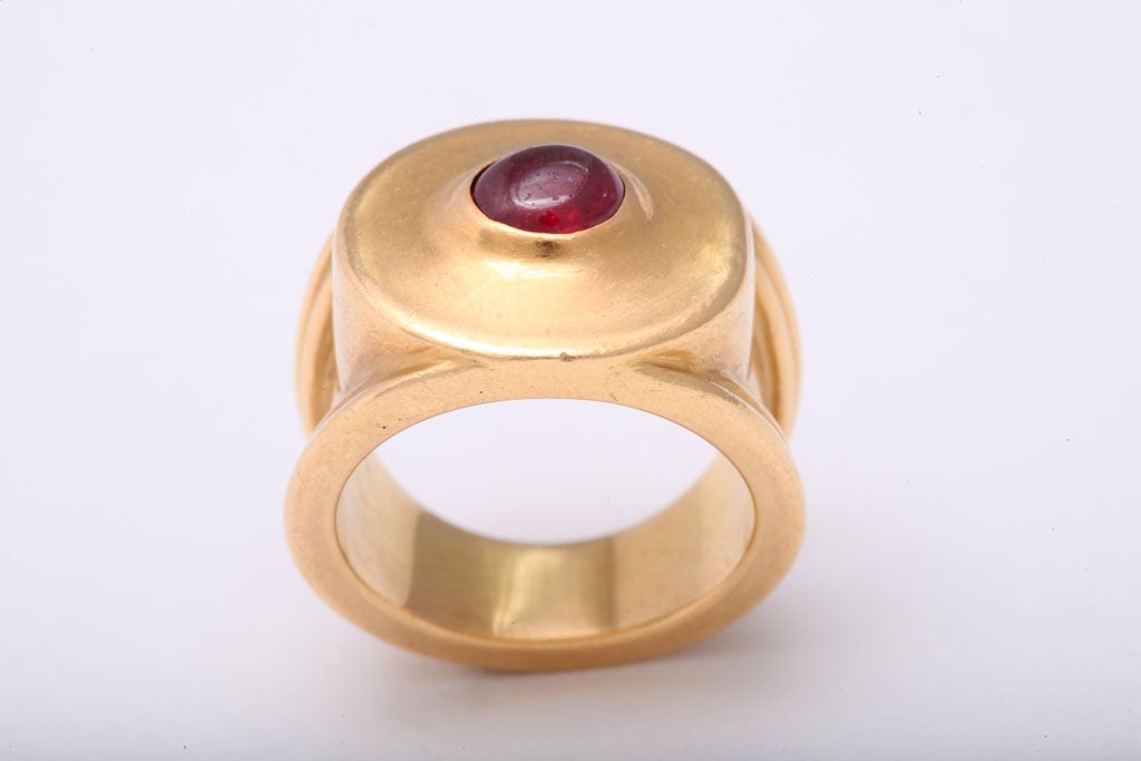 Signed Reinstein Ross 1990 22k gold wide band ring with cabochon ruby center. 
size 5.5 US