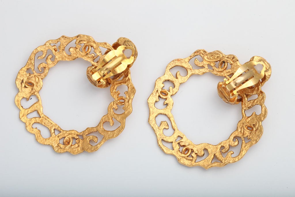 Women's  Chanel Gold Tone Hoop Earrings with CC Logos