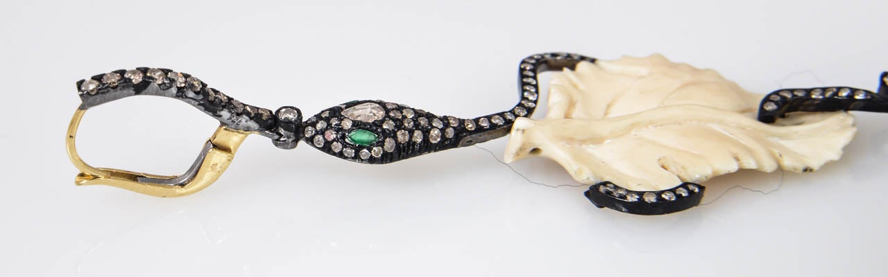 Diamond Snake Woven Around a Bone Leaf with Emerald Eyes 6