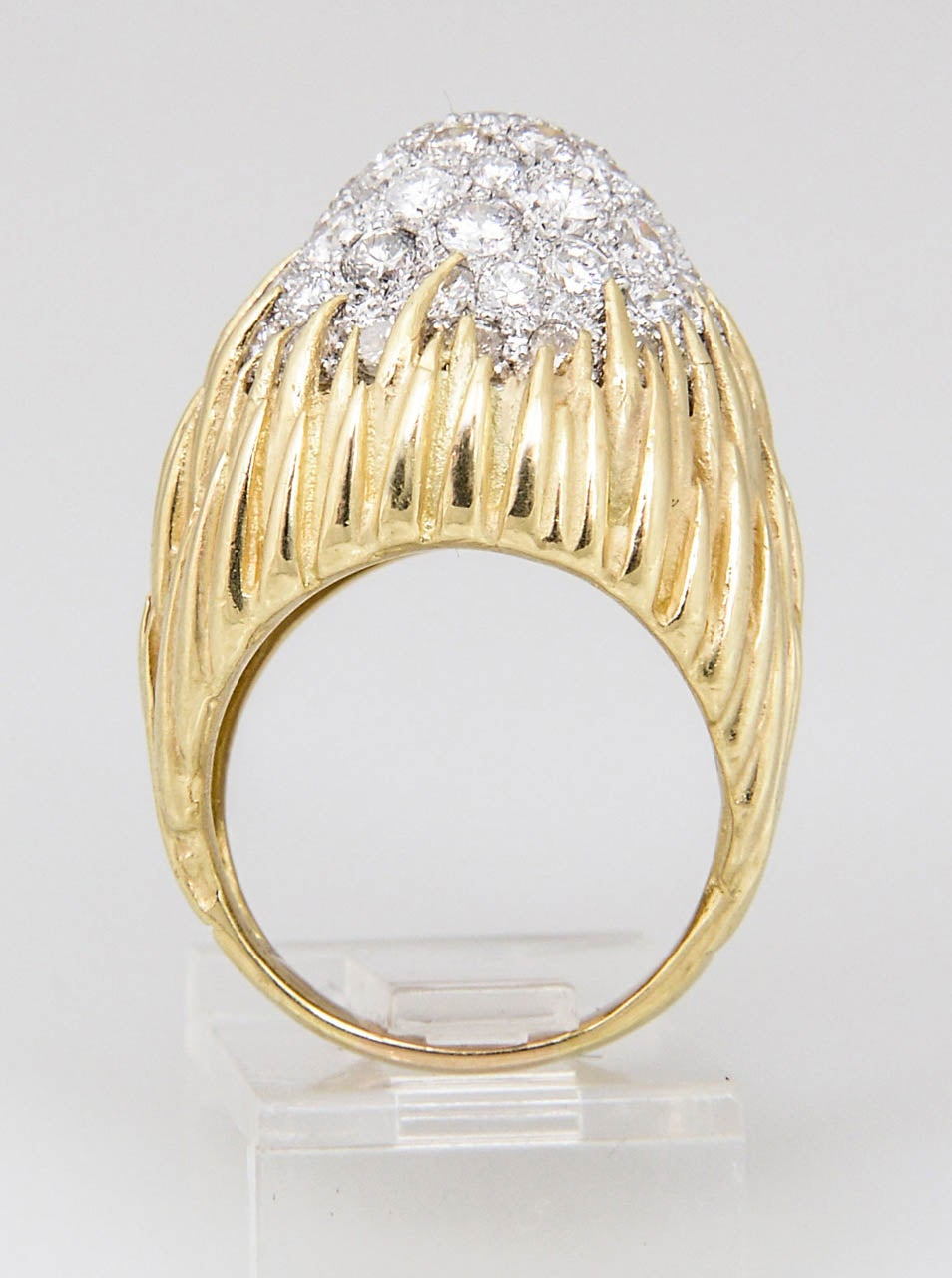 Naturalist design with vine like 18k yellow gold prongs holding 3 carats (ATW.) of pave set diamonds mounted in 18k white gold dome.

 US size between 5 3/4  - 6.