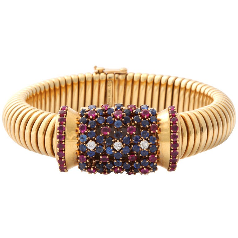 John Rubel Gold, Ruby, Diamond and Sapphire Bracelet Watch with Concealed Dial For Sale