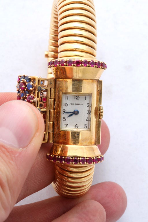 John Rubel Gold, Ruby, Diamond and Sapphire Bracelet Watch with Concealed Dial For Sale 5