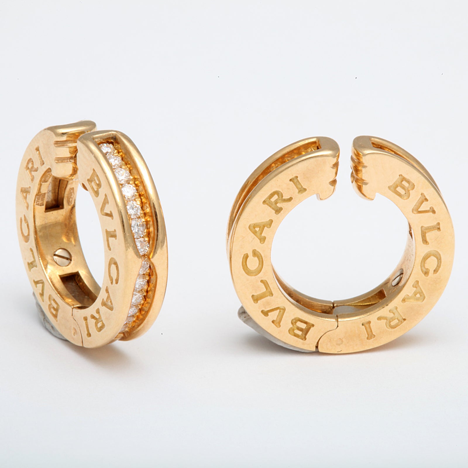 BVLGARI B. Zero diamond hoop earrings featuring 0.50 cts, in 18k yellow gold.  Fully Stamped!

Retail $6,100