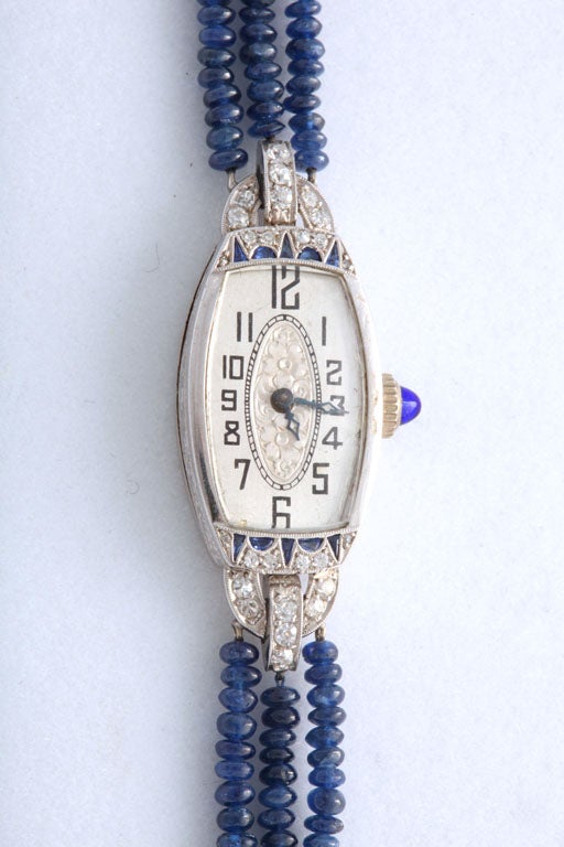 Exceptional Art Deco Diamond & Sapphire design with a beautiful (as well as easy to read)dial, this watch was originally given as a gift in 1924. We later added the sapphire beads and diamond spacers to showcase the head.  The watch head is