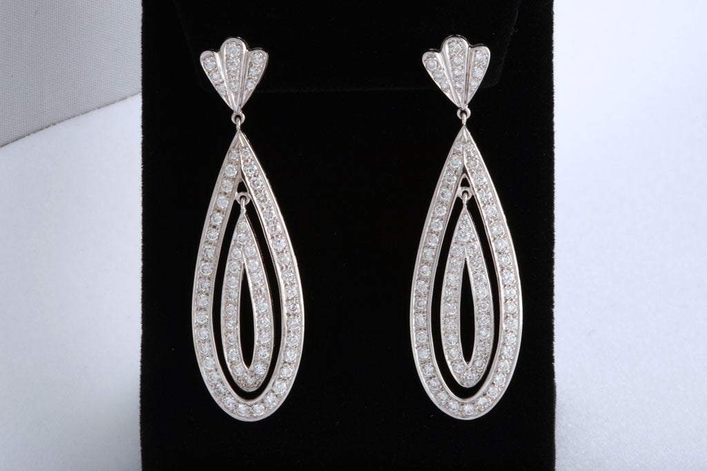 long dangle diamond earrings