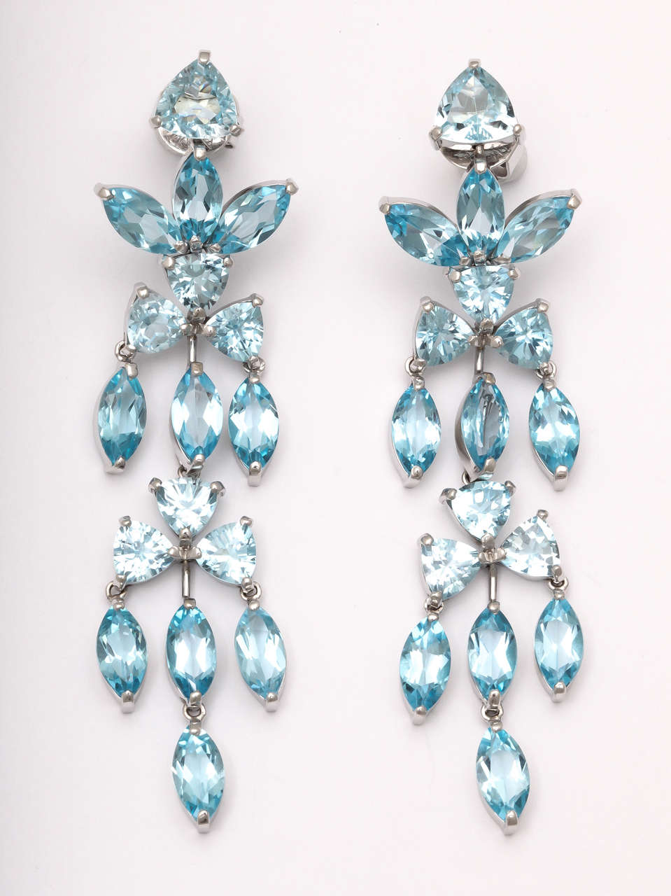Dramatic Aquamarine & Blue Topaz drop Earrings - capable of being separated & worn in a shorter length.  Blue Ice - Very sexy - very hot _ & at the same time - very cool.  Set in 18kt White Gold.  Very striking.