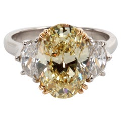 GIA Certified Oval Brilliant Fancy Yellow VS1 Diamond Ring 3