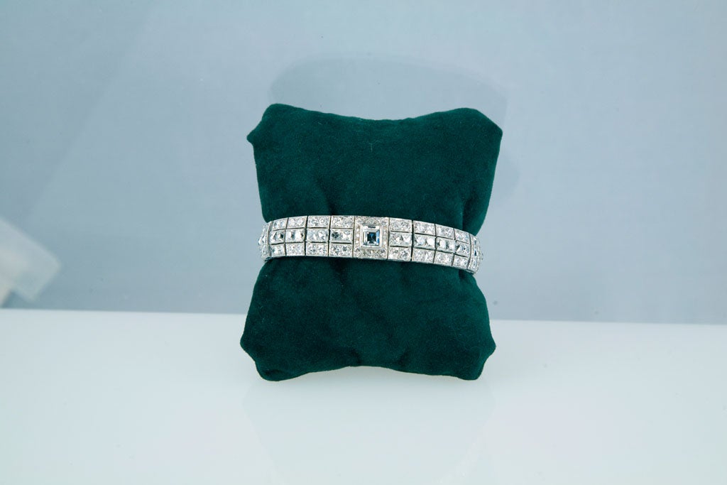 Beautiful flexible bracelet centering 1 bezel-set rectangular-cut diamond, the remaining bracelet consisting of 30 square French-cut diamonds, 36 single-cut diamonds and 86 old European-cut diamonds, total diamond weight for the bracelet is