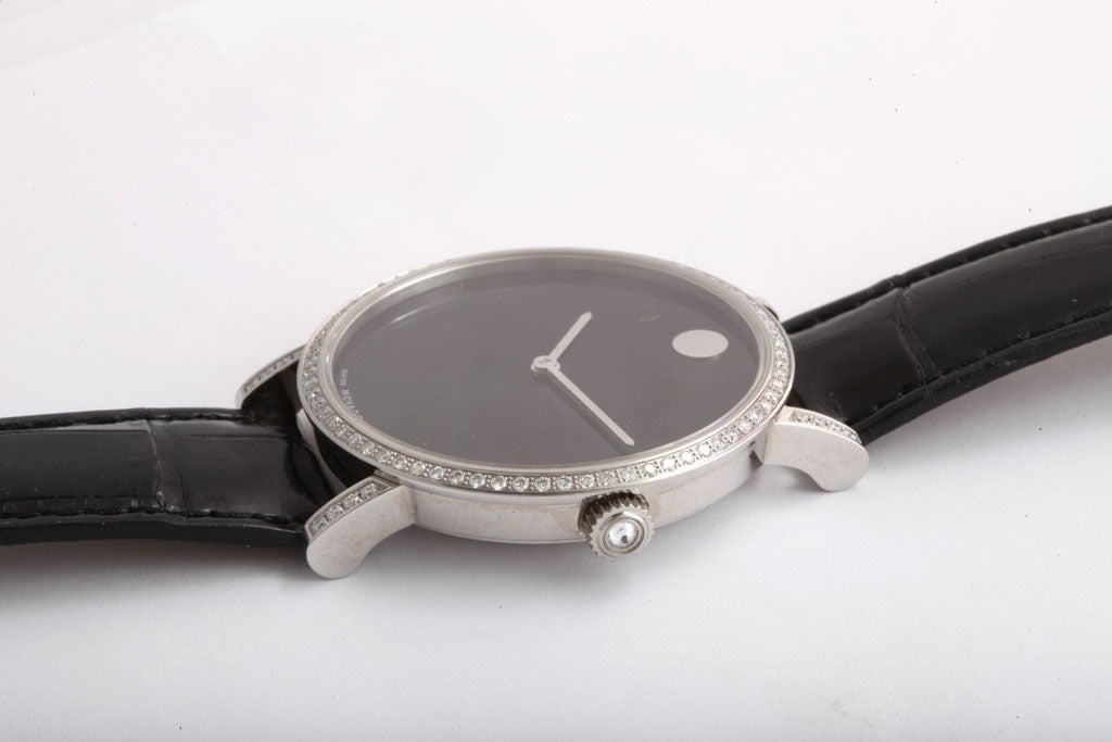 Women's or Men's MOVADO Classic Black Face Automatic Watch Surrounded by Diamonds