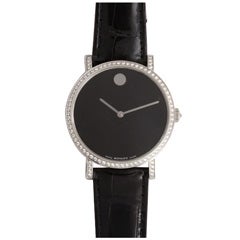 MOVADO Classic Black Face Automatic Watch Surrounded by Diamonds