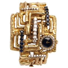 Cuff Watch, Yellow Gold, Diamonds and Saphires Circa 1970