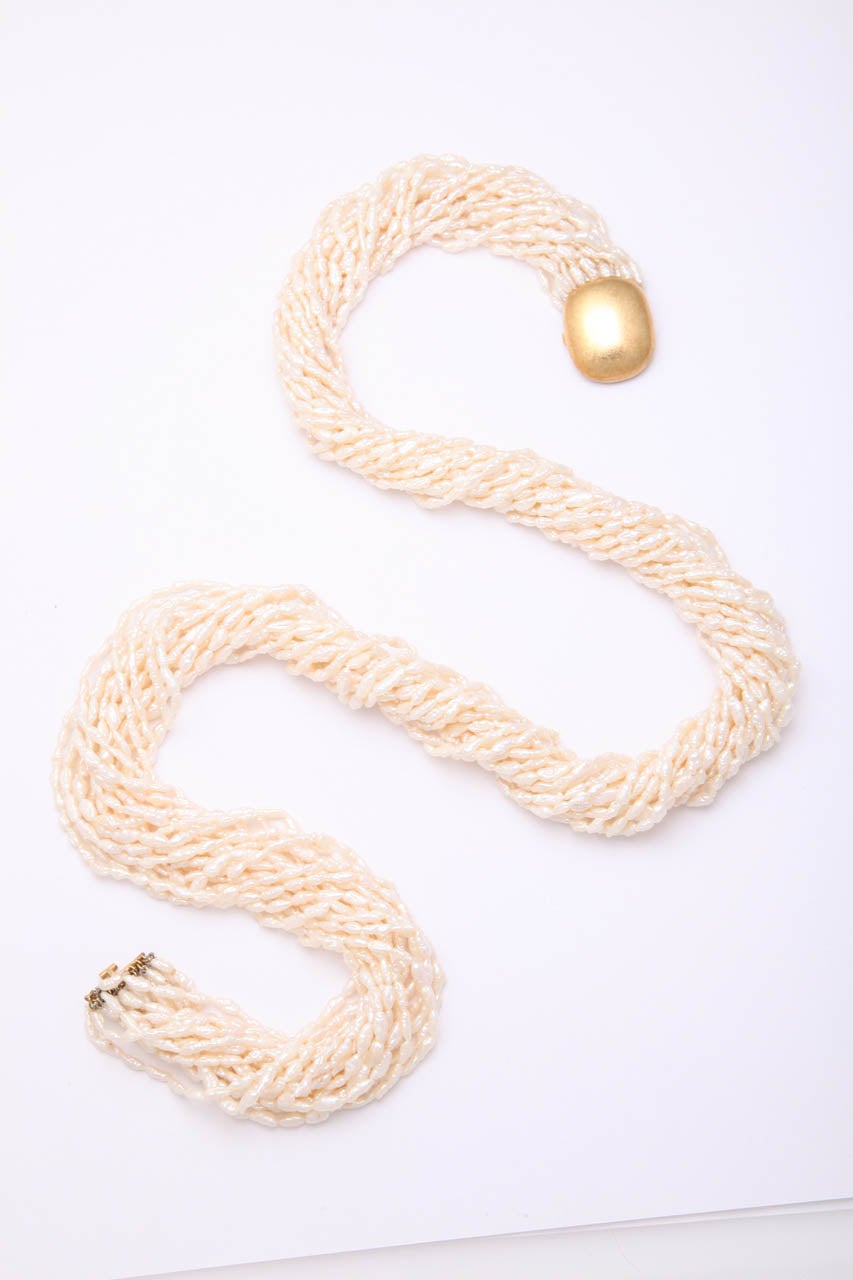 18kt yellow gold and freshwater pearl long necklace may be worn twisted and loose designed by angela Cummings for TIFFANY &;Co.