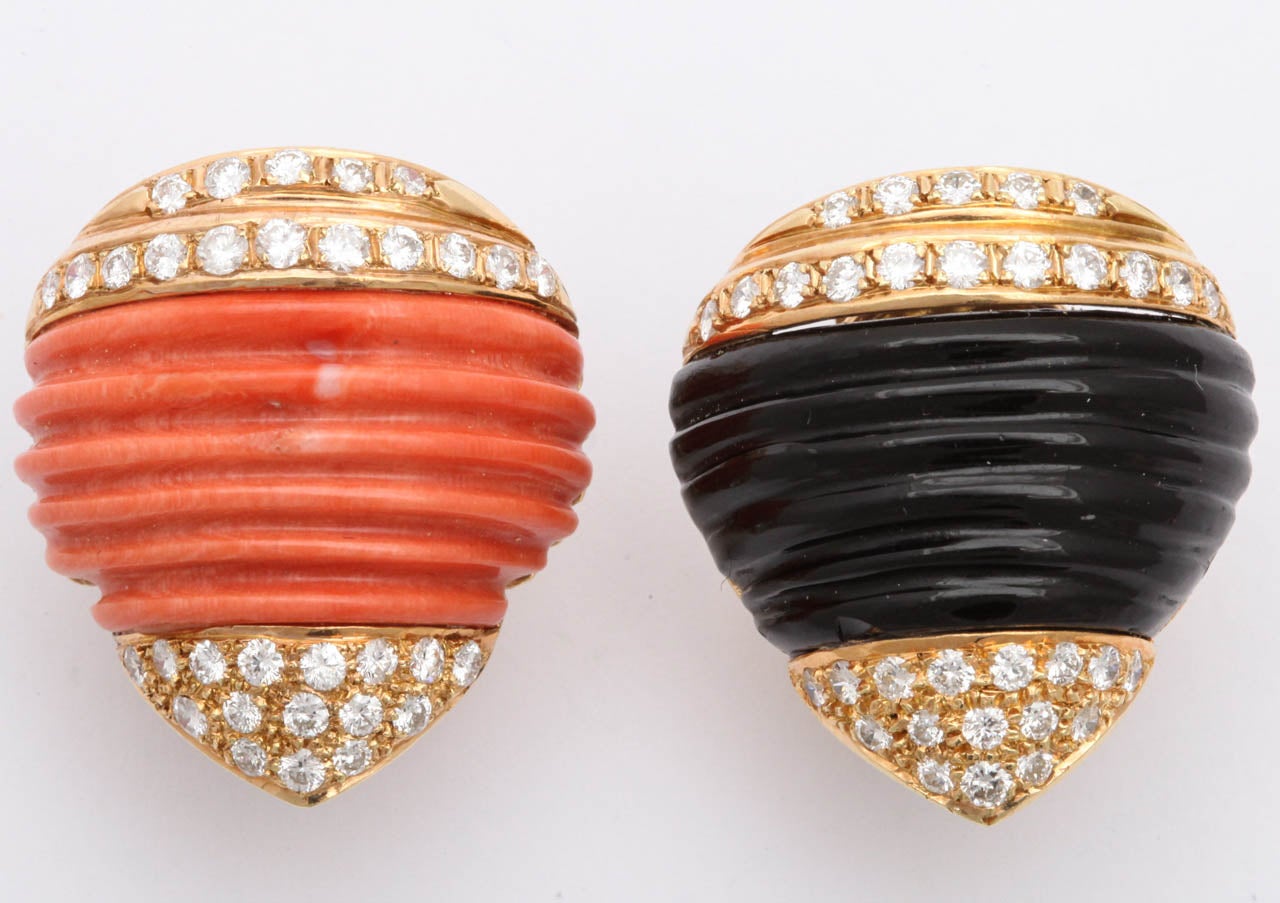 18kt Yellow Gold And Diamond Earclips Centering one Custom Barrel Cut Onyx And On The Other Earring centering One custom cut Barrel cut Coral Piece Very Unusual Design and Craftmanship With Very Fancy Cip On Backs Of Very High Quality