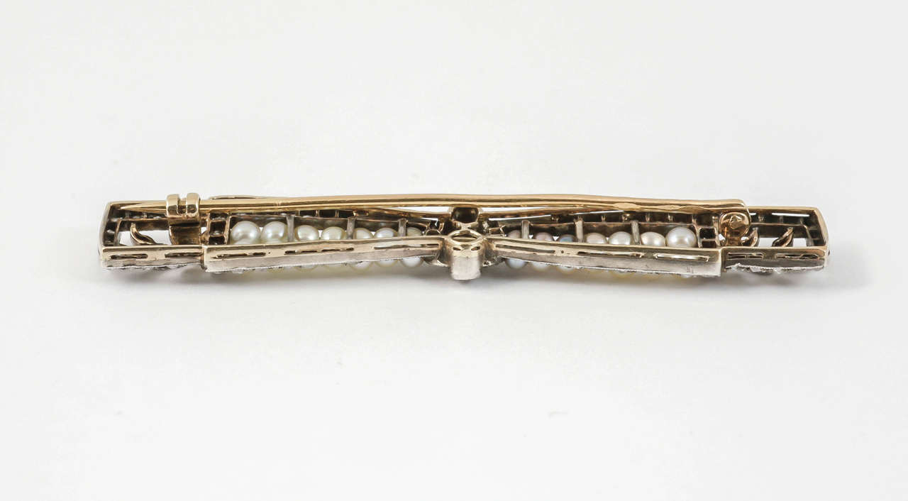 French Natural Pearl Diamond Bow Brooch In Excellent Condition For Sale In London, GB