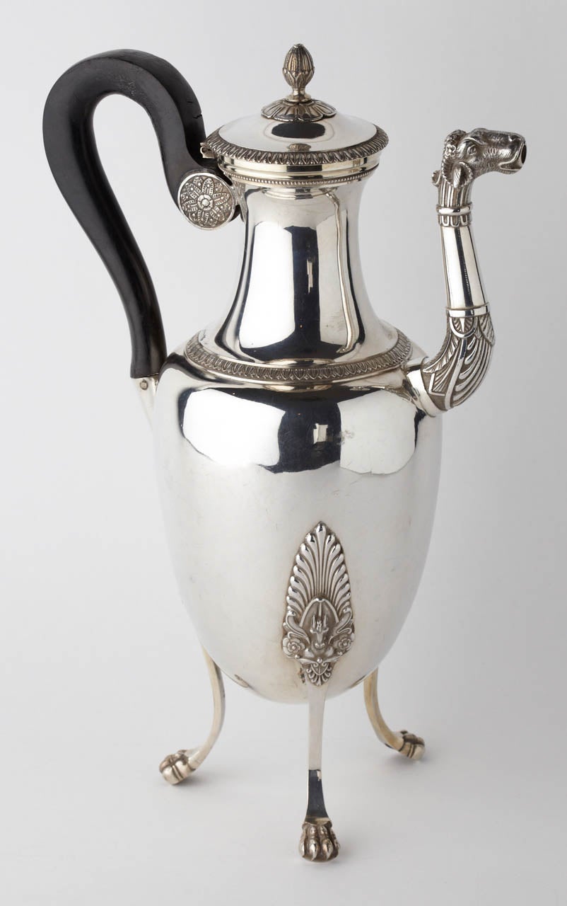 The coffee pot is empire style with typical acantus leaves decorations and horse head spout fully hallmarked 950/1000 silver made in Paris between 1814 to 1822 by Lun Naudin (working period) bearing French marks used between 1819 to 1838