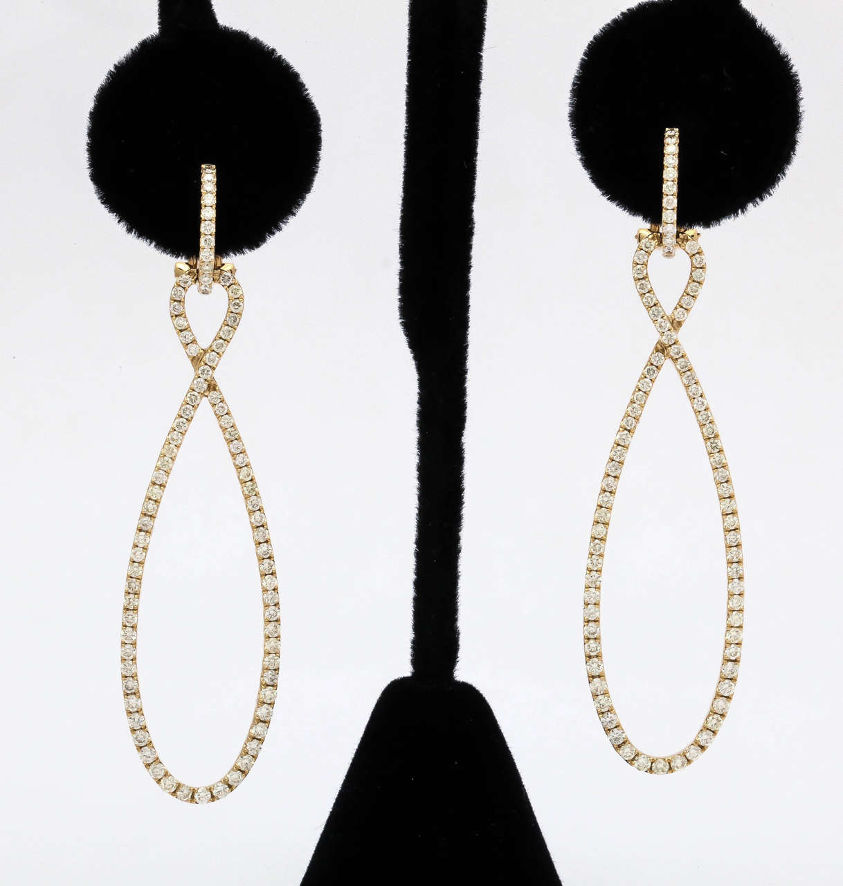 18k yellow gold and diamond "figure 8" design drop earrings containing 166 full cut round diamonds 2.54 ct.