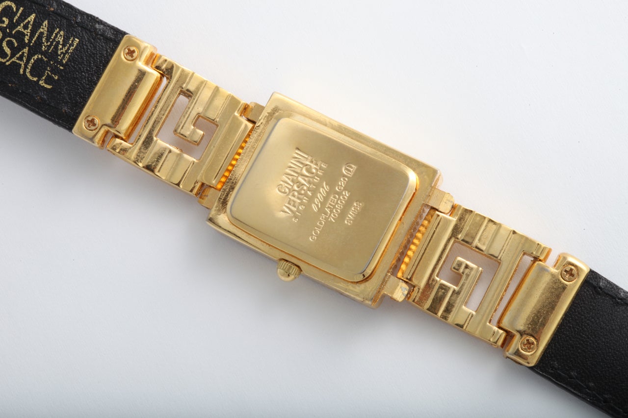 Gianni Versace Gold and Black Medusa Watch With Greca In Excellent Condition In Chicago, IL