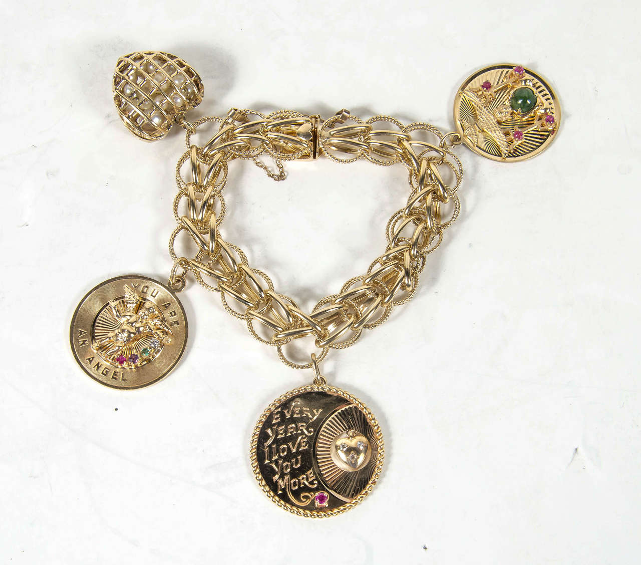 1950s Gold Multi Charm Bracelet With Cartier Charm at 1stDibs 1950s