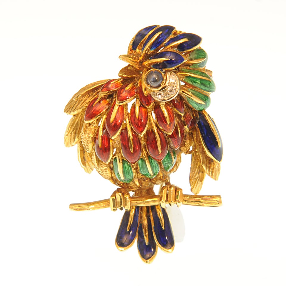 Adorable enamel pin made on 18k yellow goldwith sapphire & diamonds eye accents.