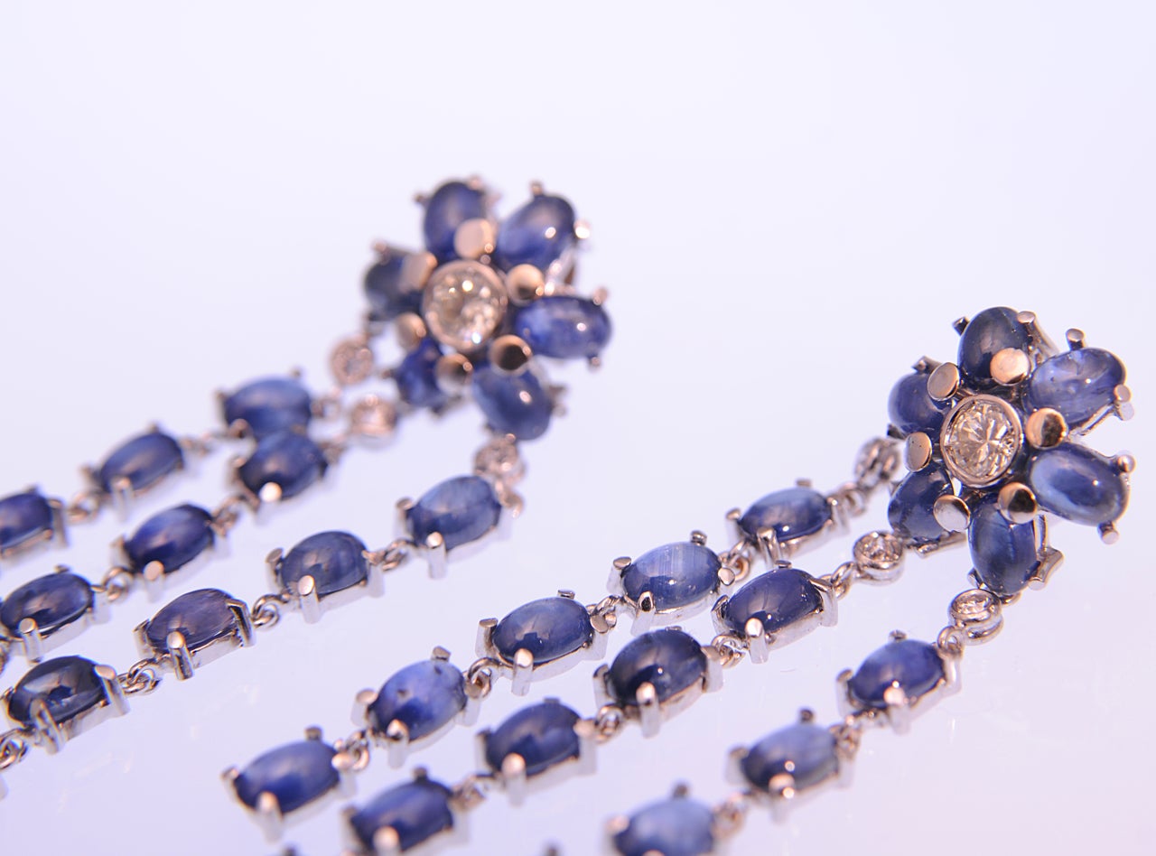 Women's Dangling Sapphire and Diamond Gold Flower Earrings For Sale